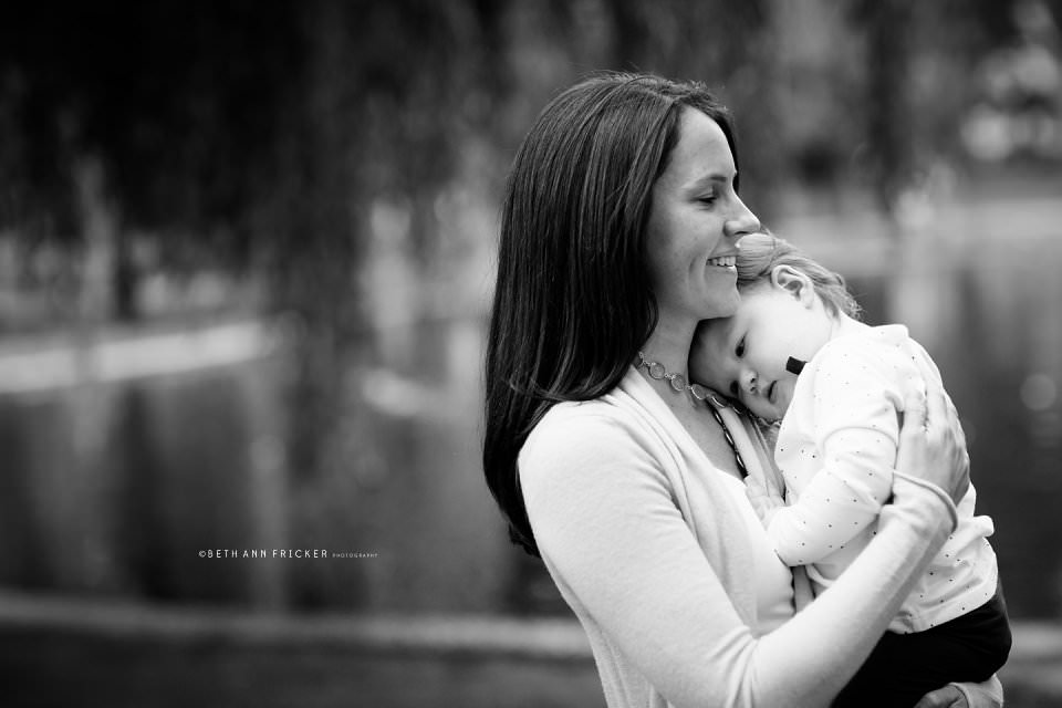 mom and daughter cuddling  public gardens boston baby photographer