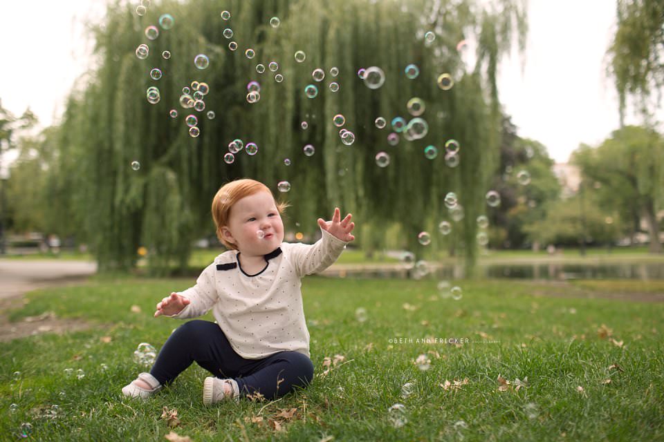 toddler with bubbles public gardens boston baby photographer