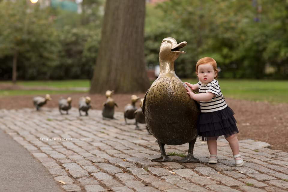 toddler by duckling statues public gardens boston baby photographer