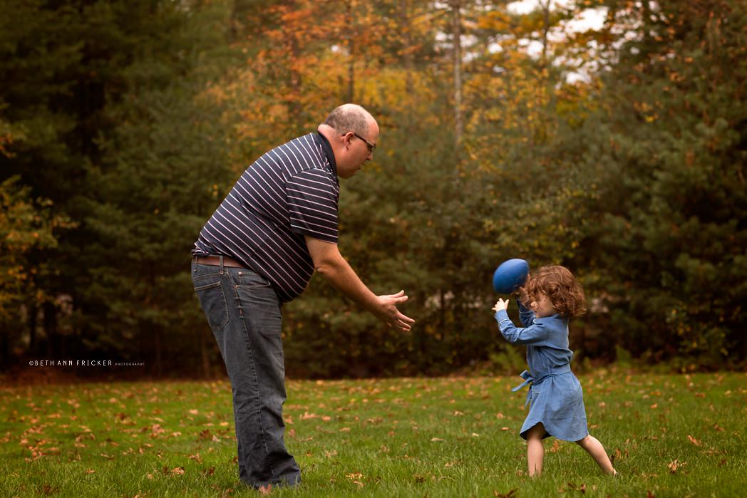 duaghter playing catch with dad Boston Family Photographer