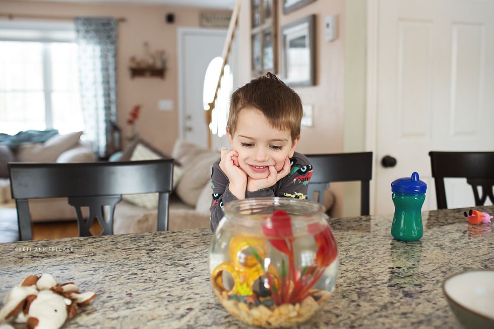 toddler with fish boston family lifestyle photographer