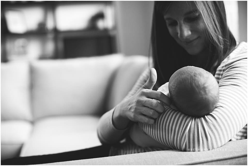mom holding baby boston newborn lifestyle photographer