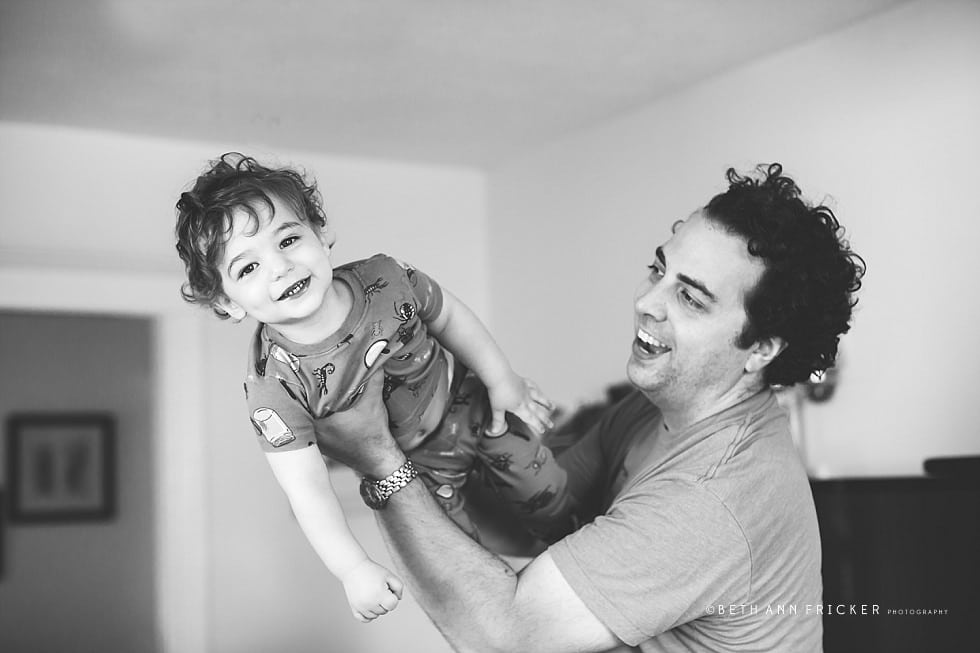 Boston newborn lifestyle photographer playing around with dad