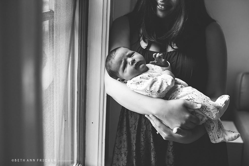 Boston newborn lifestyle photographer newborn in mom's arms