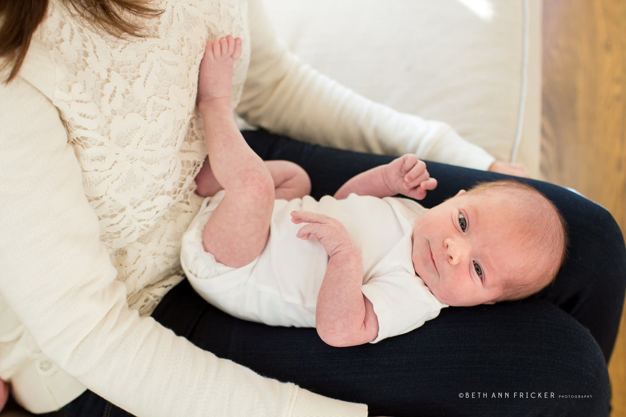 baby in mom's lap Wellesley Newborn photographer