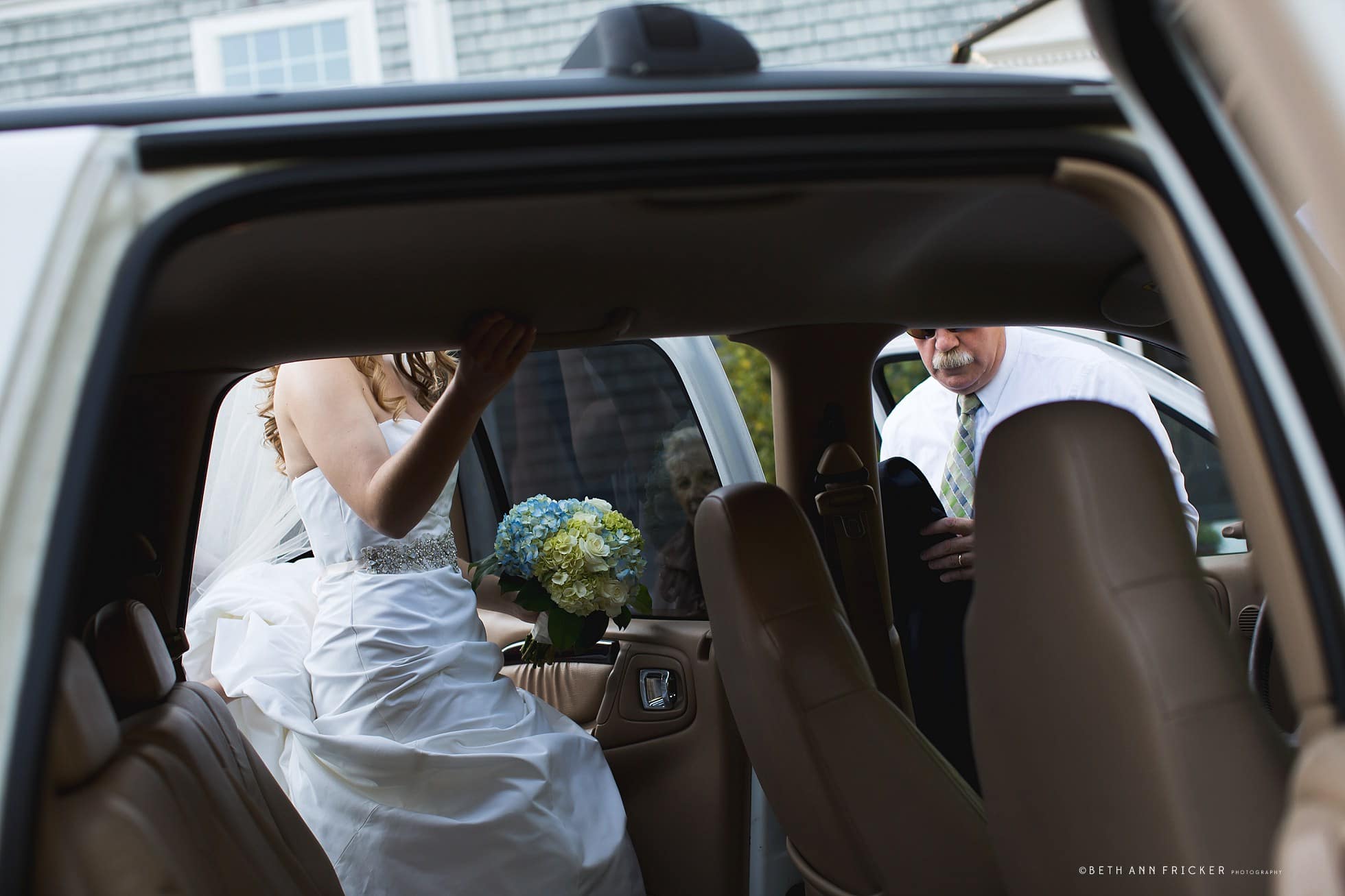 Bride getting into car Duxbury MA Wedding Photographer