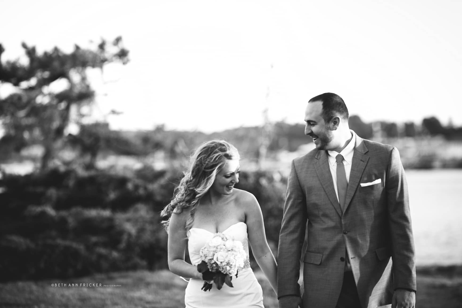 bride and groom at sunset on water Duxbury MA Wedding Photographer