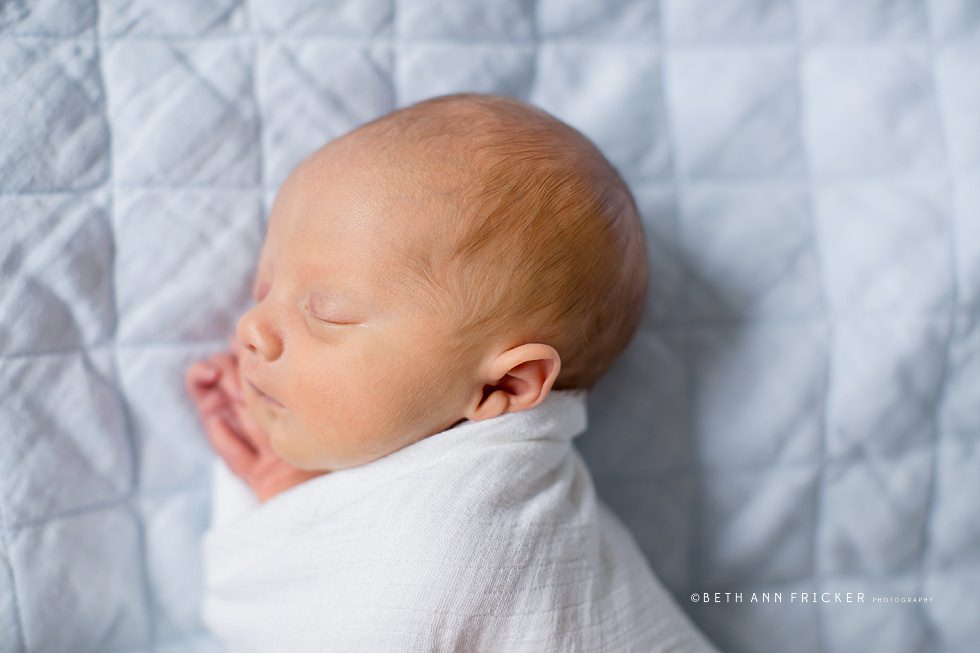 newborn photo on baby blanket north shore newborn lifestyle photographer