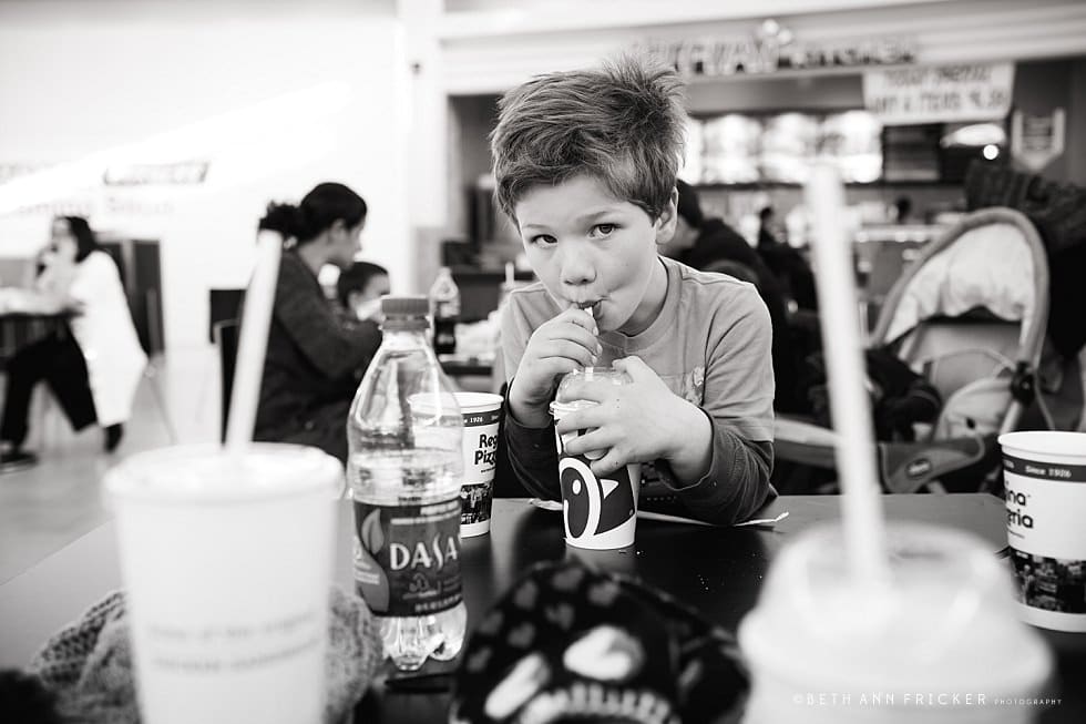 Boy eating dinner Burlington Mall Boston Family Photographer Project 366