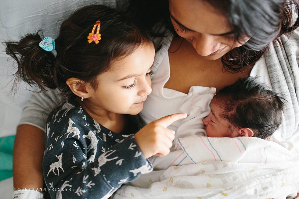 big sister with newborn baby Boston newborn Photographer hospital session