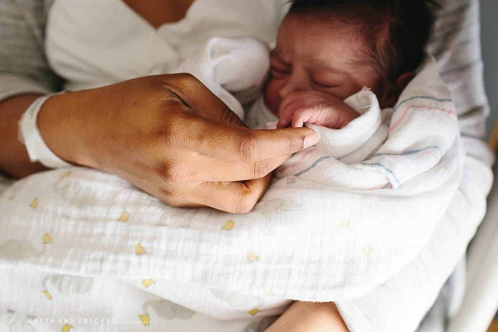 newborn baby holding mom's hand Boston newborn Photographer hospital session