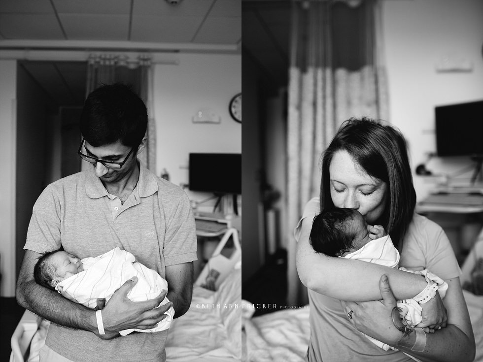dad and dad with newborn daughter in hospital cambridge ma newborn photograher