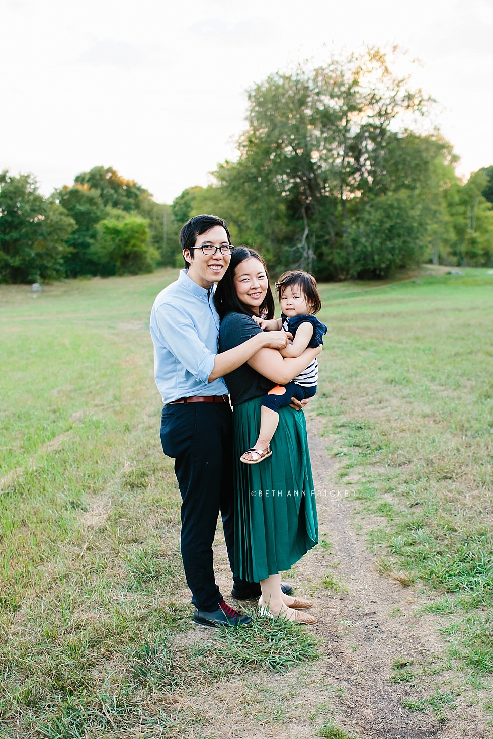 adorable two year old girl with parents brookline family photographer