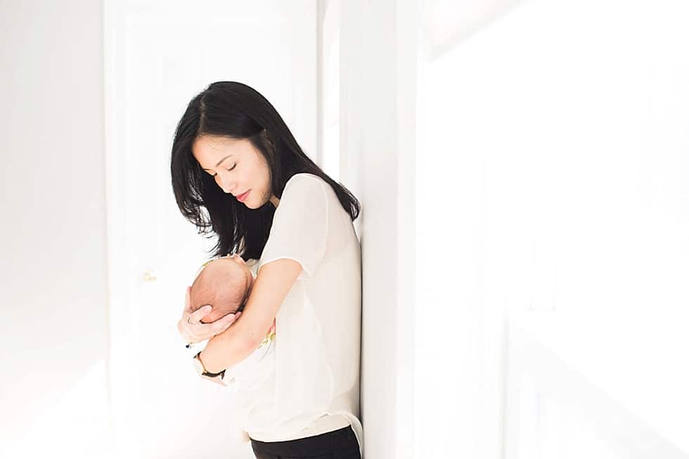 newborn baby in mom's arms wayland ma newborn photographer