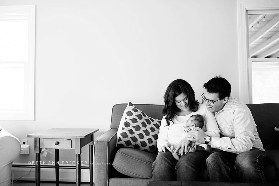 baby in mom and dad's arms boston newborn photographer