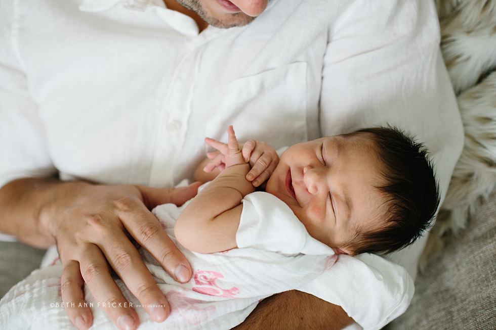 newborn baby hanging out with dad in his arms natick ma newborn photographer