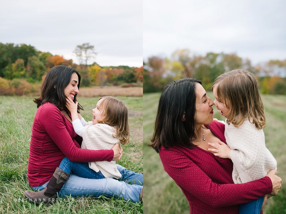 daughter and mom playing around Boston Maternity Photographer