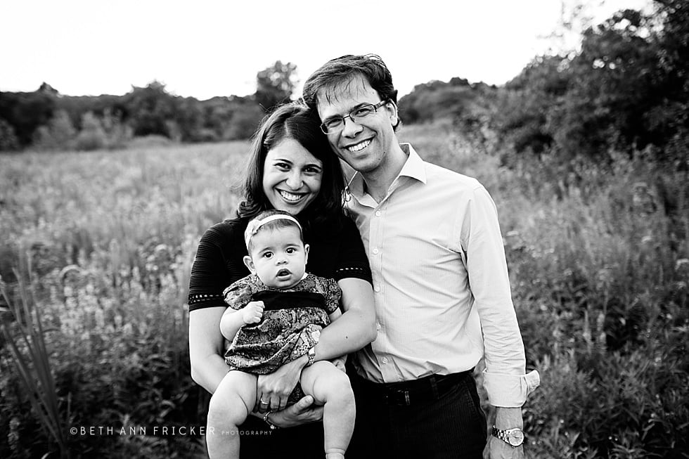 family with baby walking on a boardwalk Somerville family Photographer