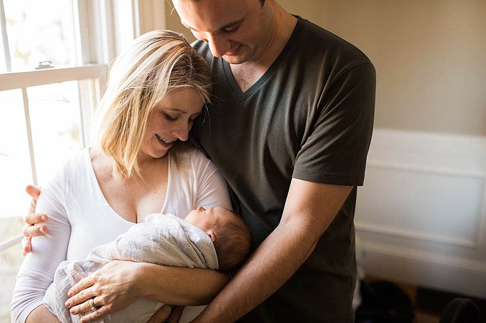 parents with newborn baby Newton Newborn Photographer