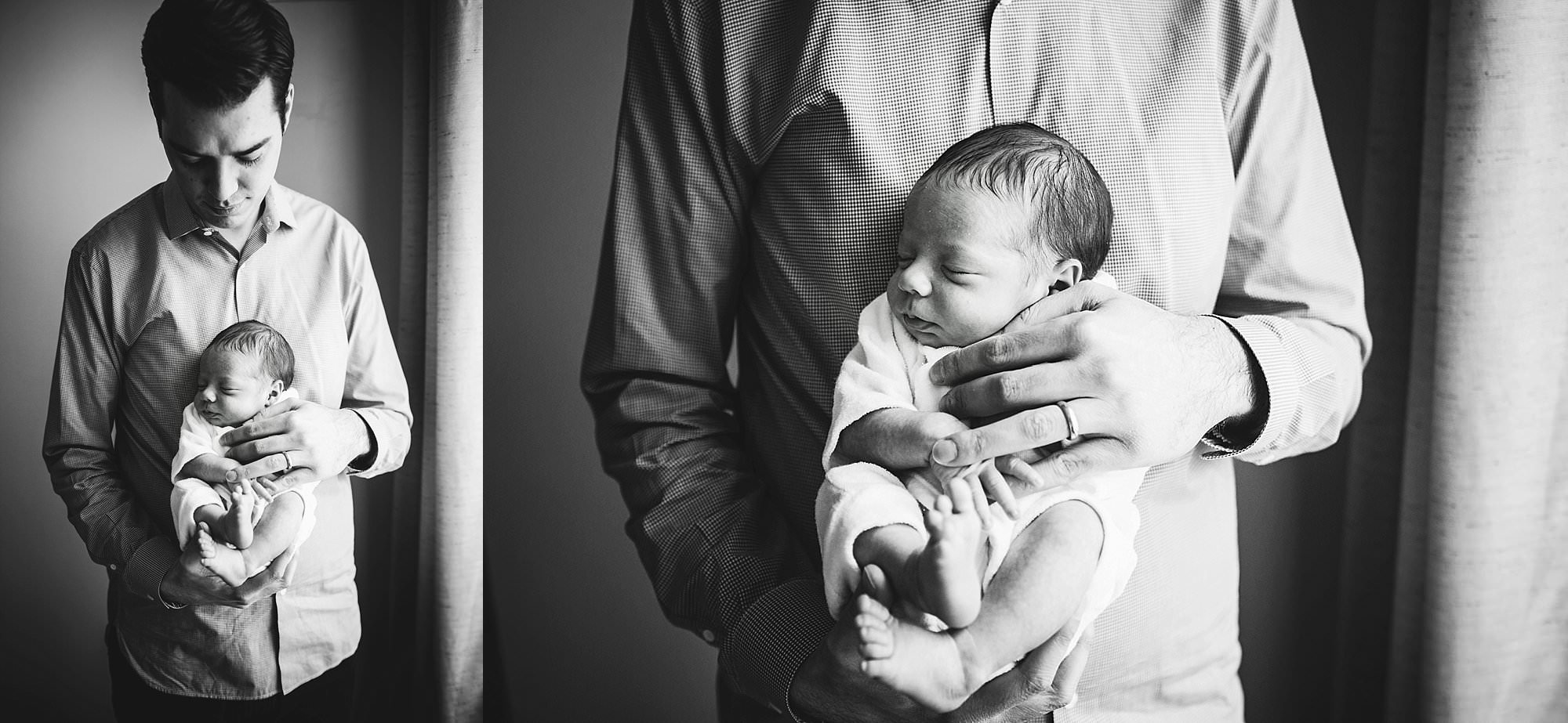 dad holding newborn son black and white photo boston newborn photographer