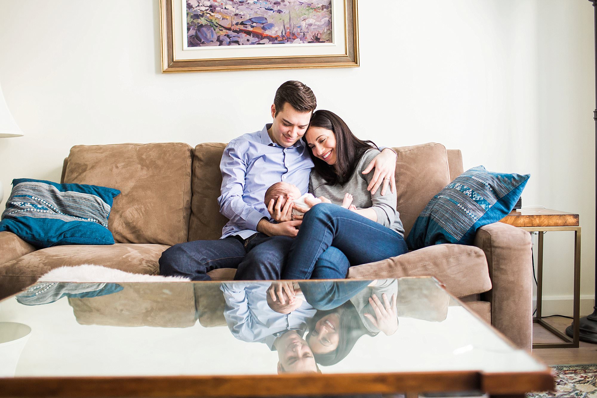 parents snuggling with newborn son boston newborn photographer