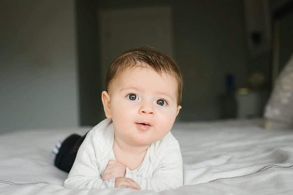 baby doing tummy time in Boston apartment