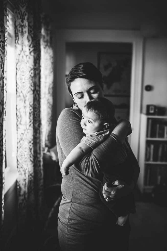 In mom's arms black and white Boston baby photographer