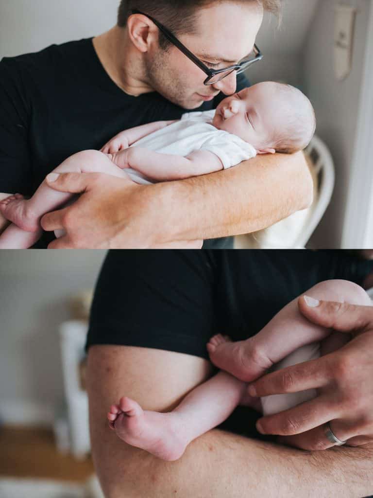 newborn in dad's arms Boston Baby photos
