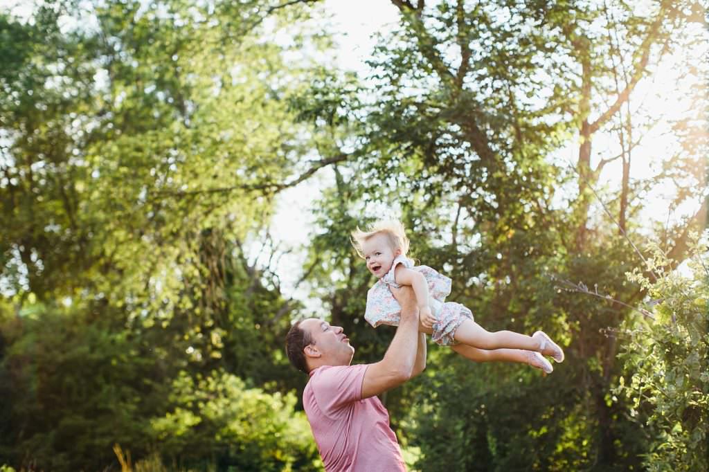 daughter being tossed in the air by dad Boston Family Photographer