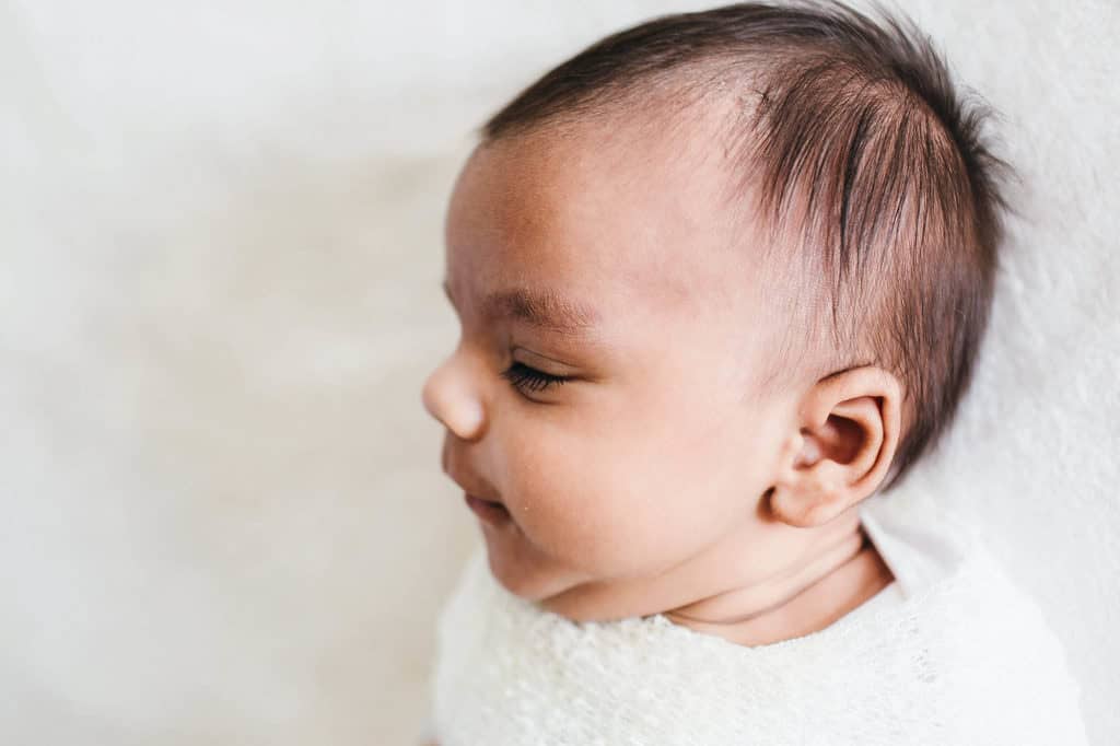 North Shore newborn photographer profile of baby's face