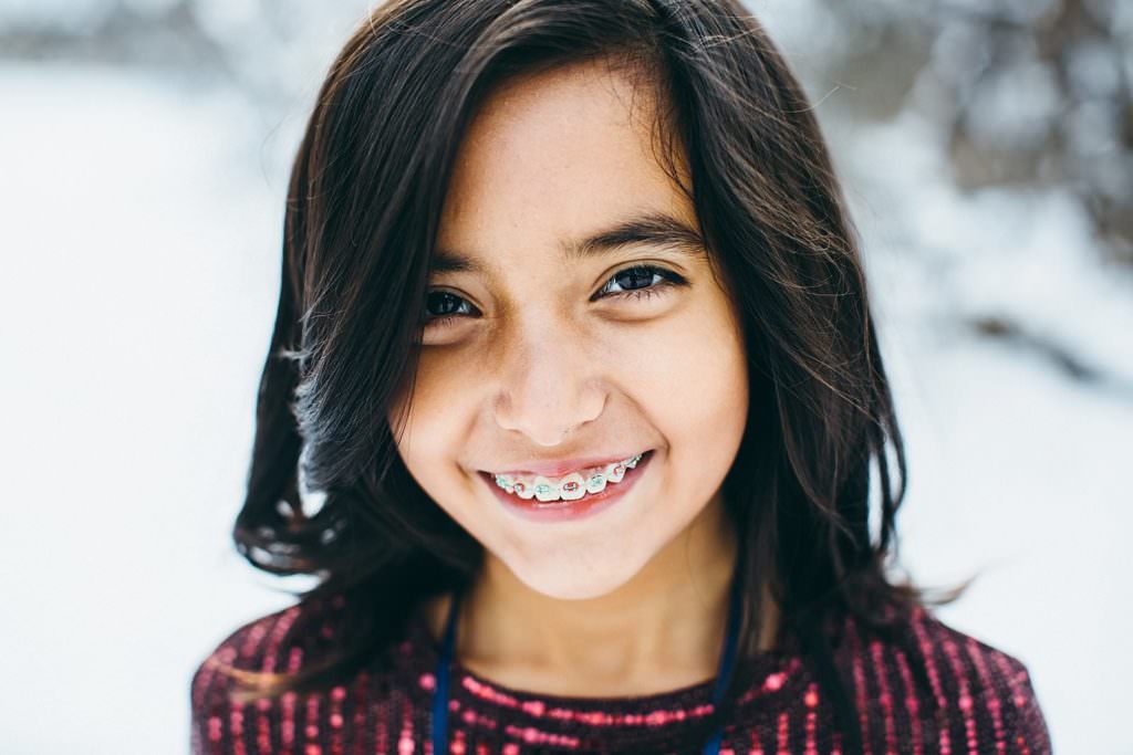 portraits of a girl in the snow Massachusetts Family photographer