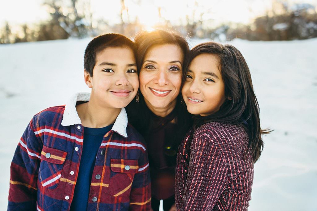 portraits of a kids with mom in the snow Massachusetts Family photographer