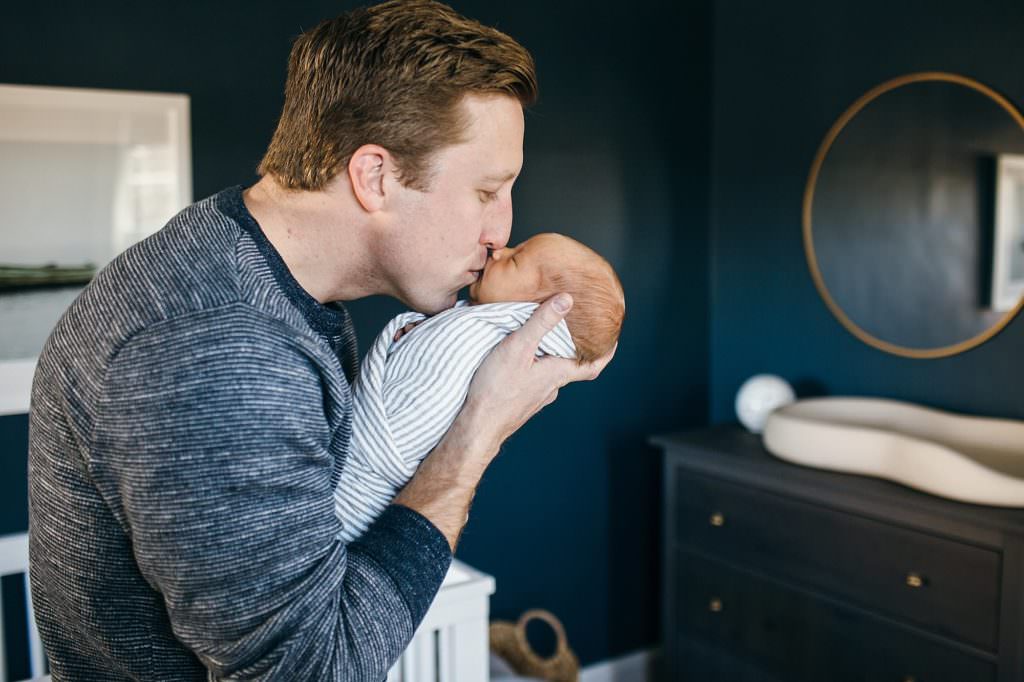 dad kissing baby Medford Newborn photographer