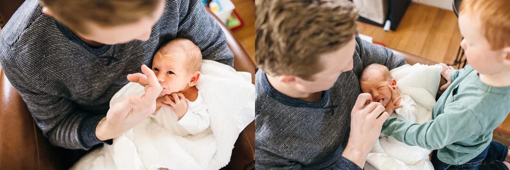 dad holding baby Medford Newborn photographer