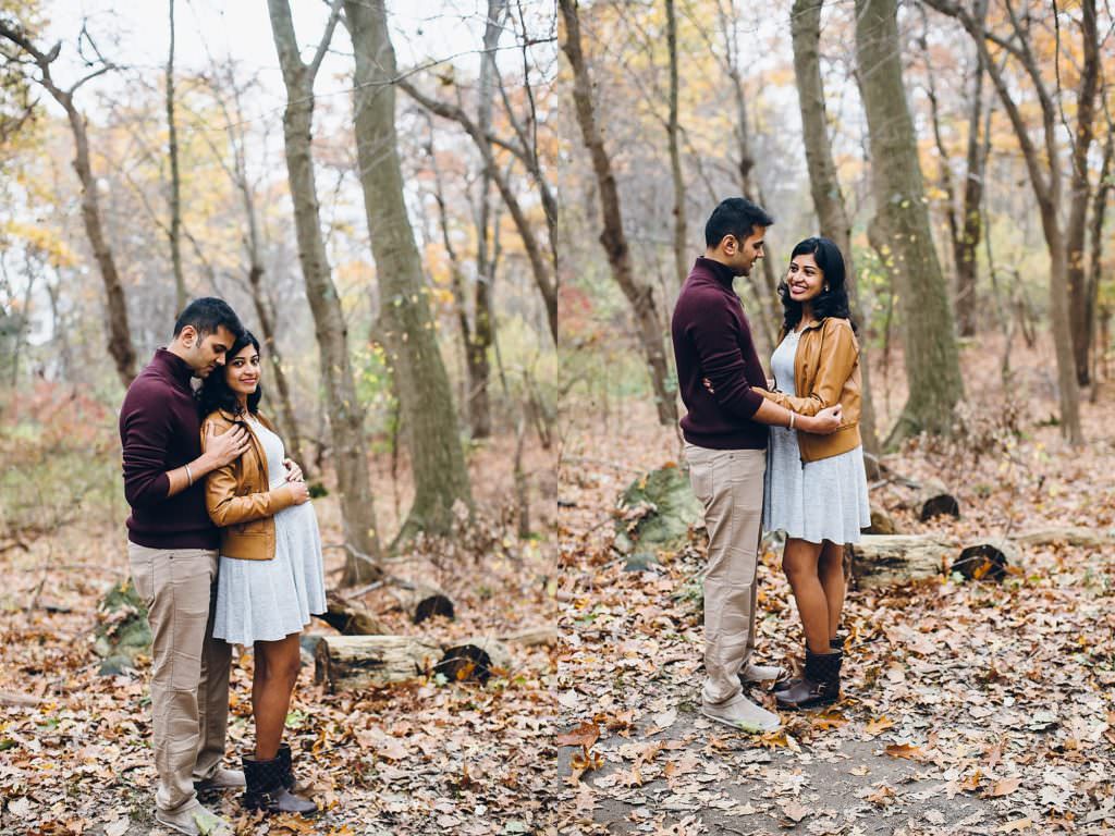 Pregnant mom looking at dad snuggling in forest Boston Maternity photos
