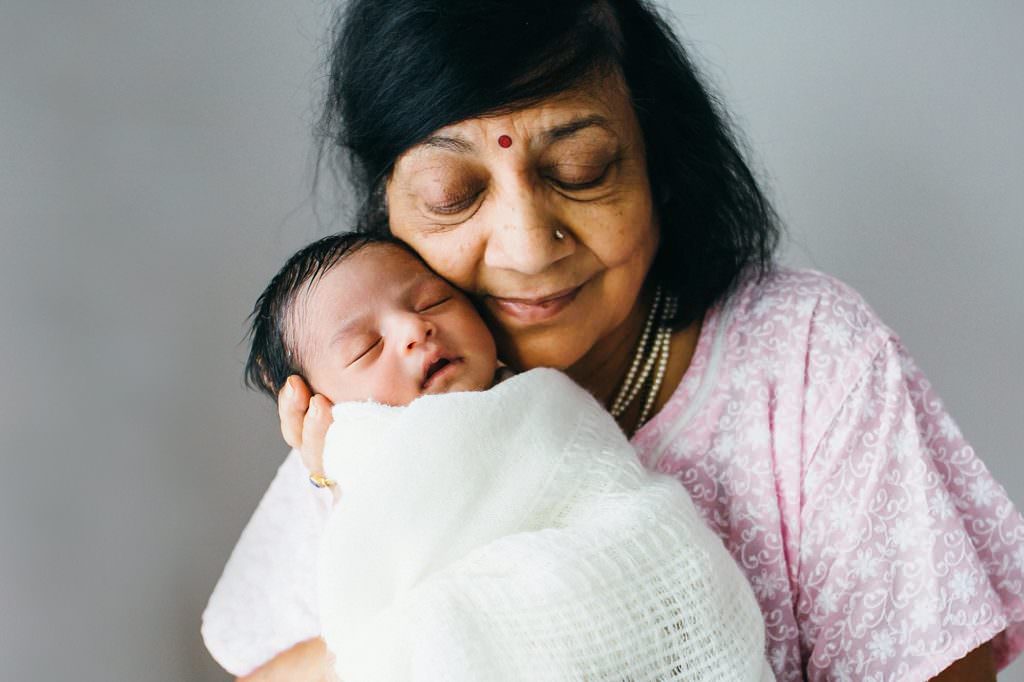 grandma holding baby Bedford Newborn Photographer