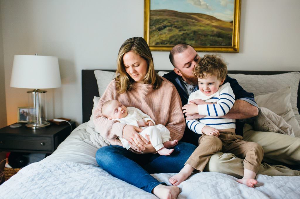 family snugging together North Shore Newborn Photographer