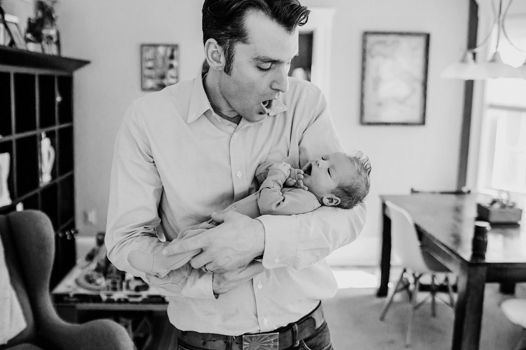 dad holding baby Medford newborn photographer 