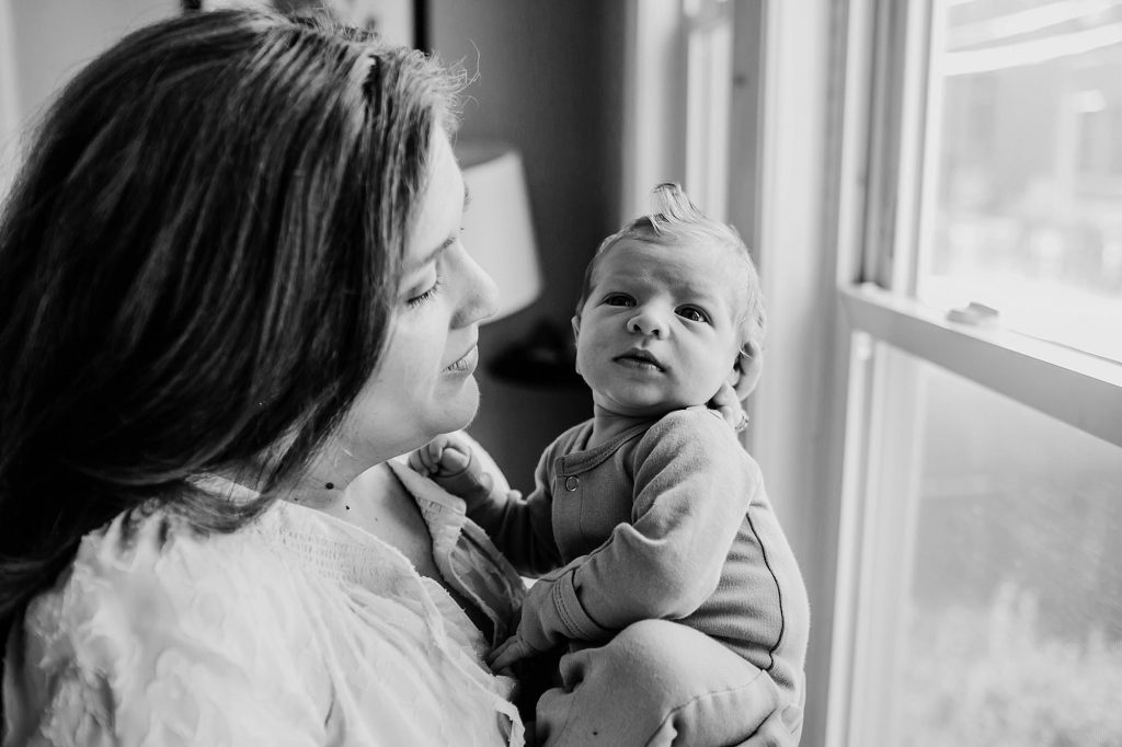 mom kissing baby Medford newborn photography