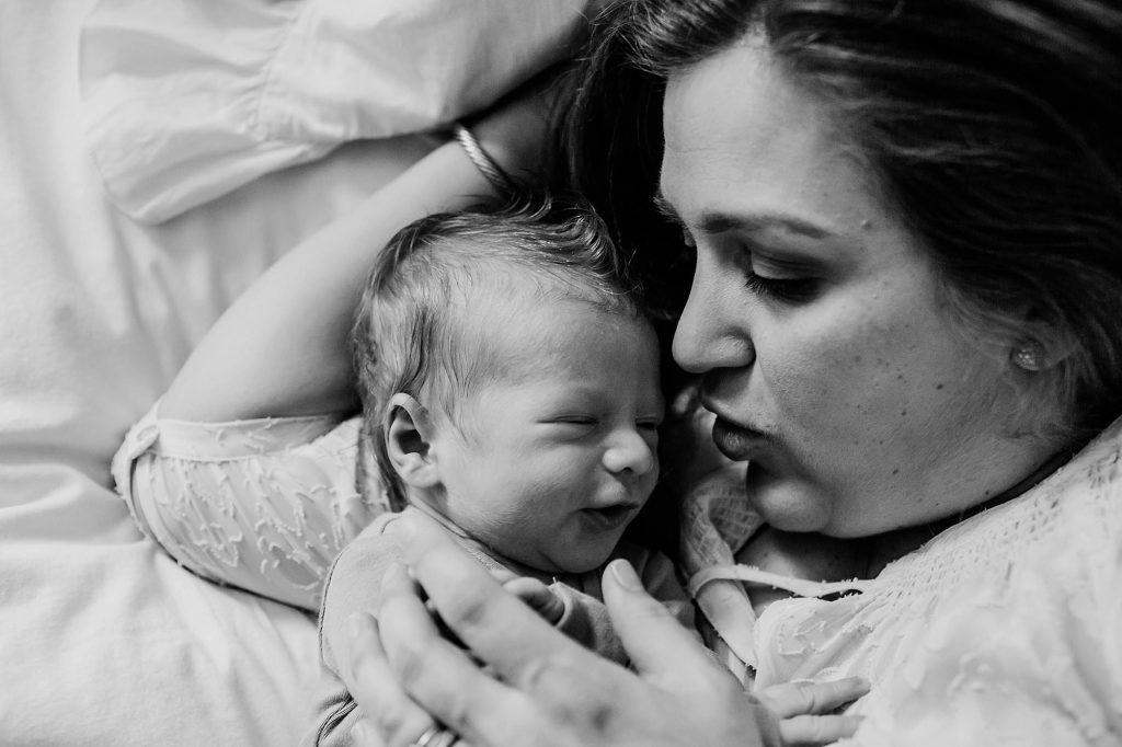 mom and baby next to each other Medford newborn photography