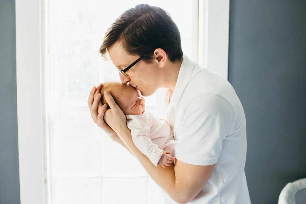 dad kissing baby Melrose newborn photographer