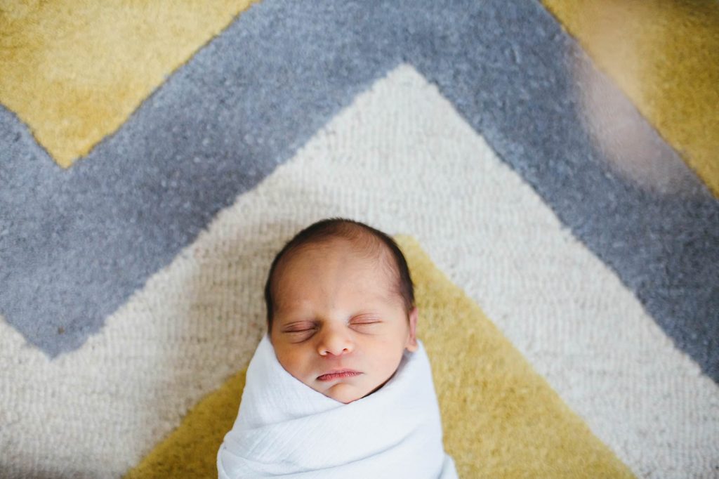 baby in the nursery somerville newborn photographer