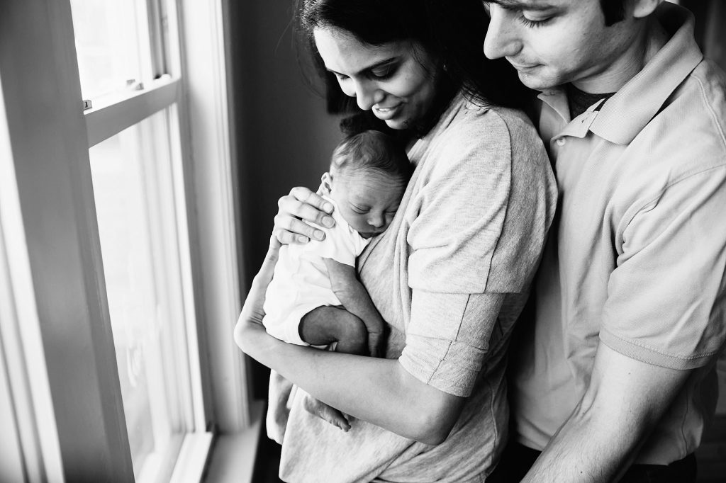 parents with baby somerville newborn photographer