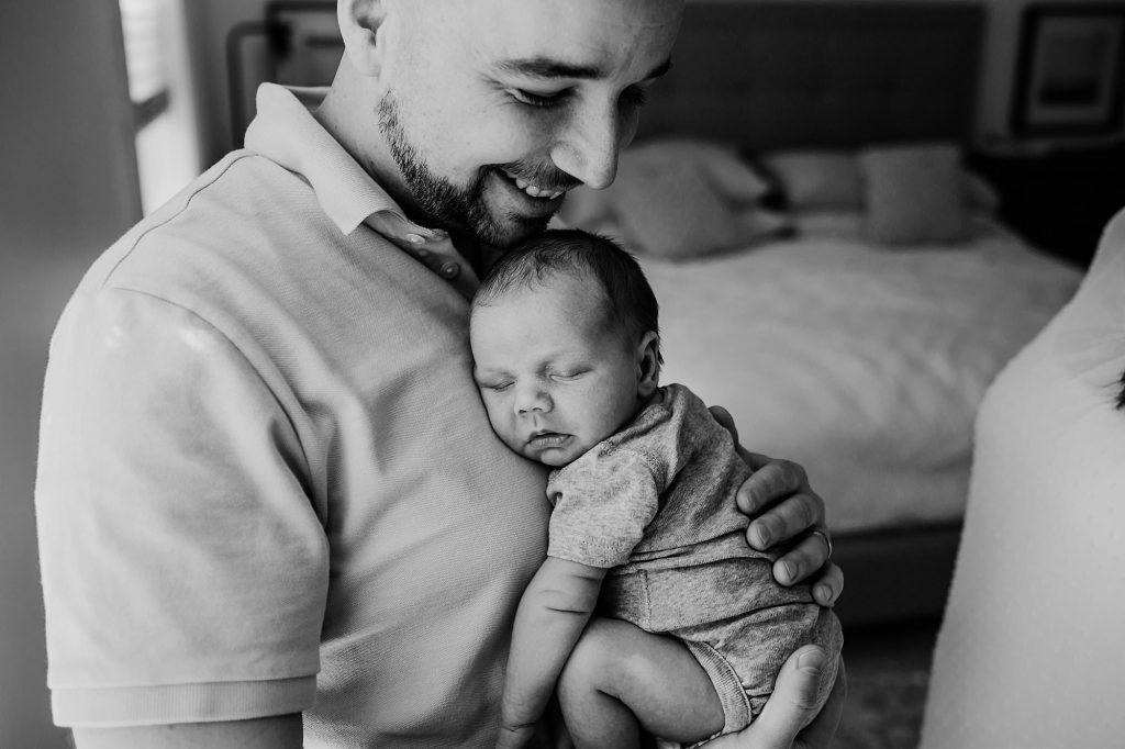 Dad holding baby Newburyport Newborn Photographer