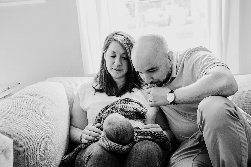 Dad kissing baby's toes Newburyport Newborn Photographer