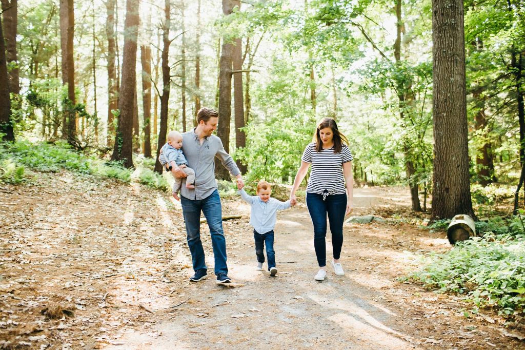 family walking in woods Medford Family Photographer