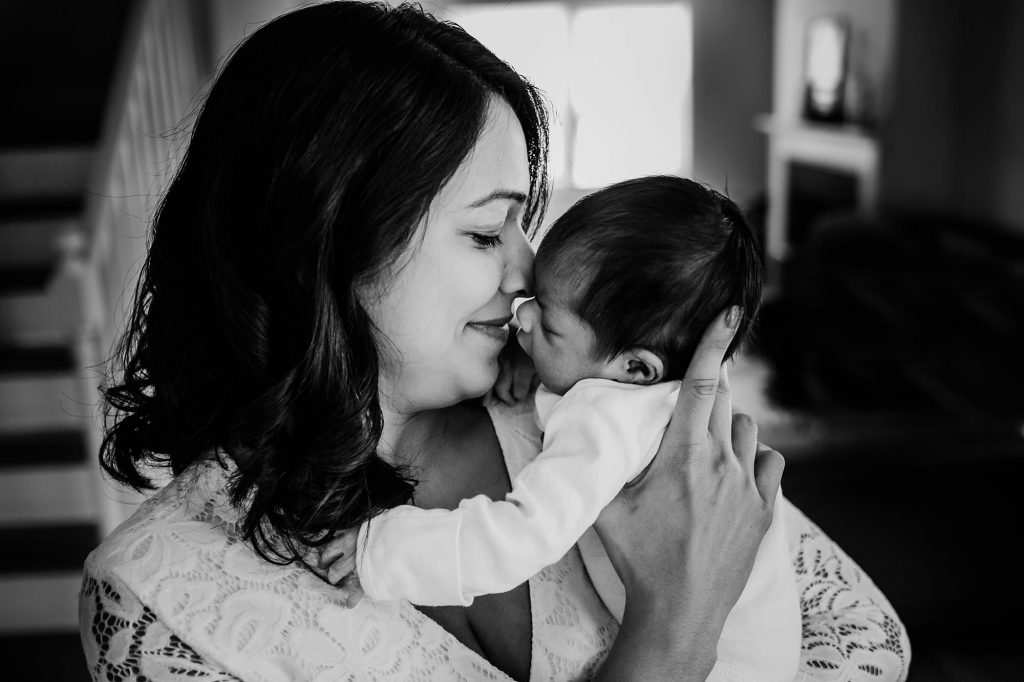 mom kissing baby Arlington MA Newborn Photographer