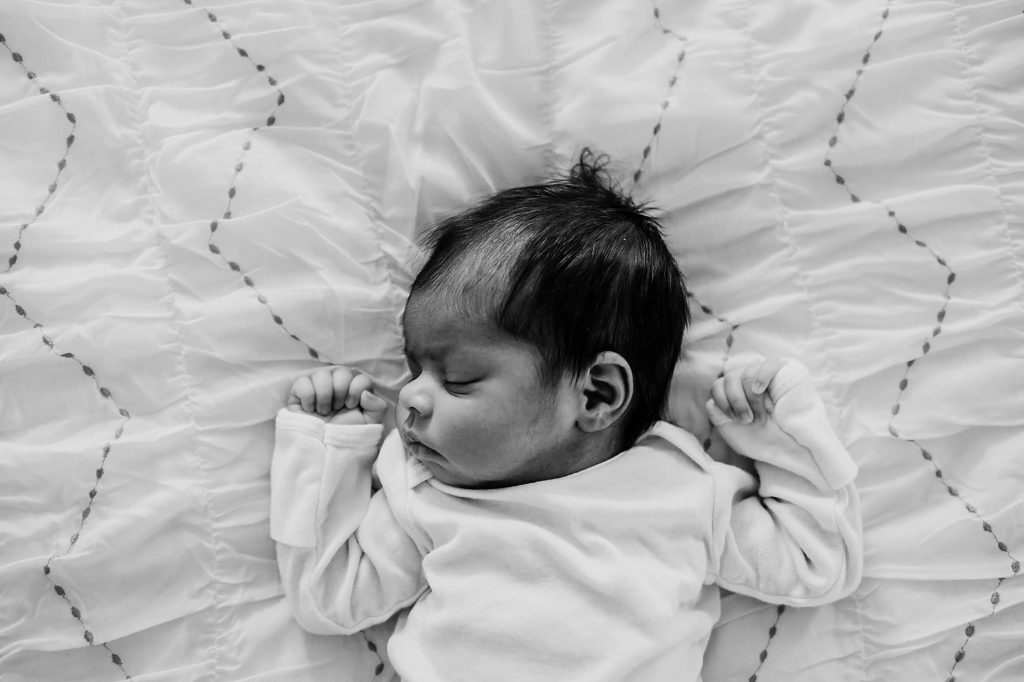 baby sleeping on bed Arlington MA Newborn Photographer