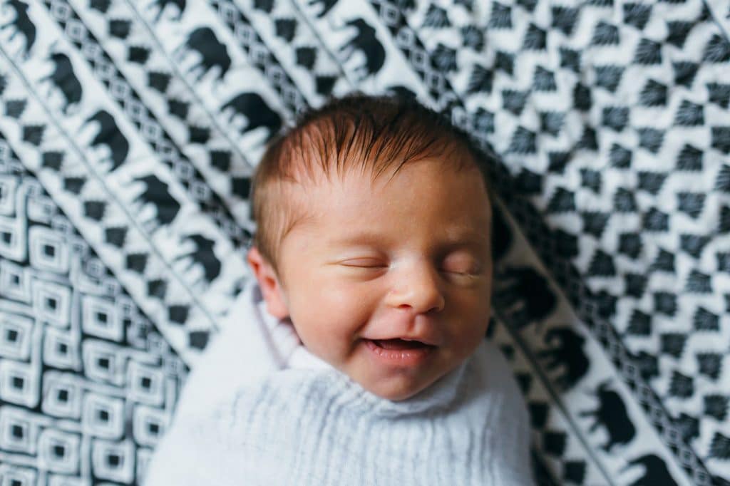 baby smiling belmont newborn photographer 