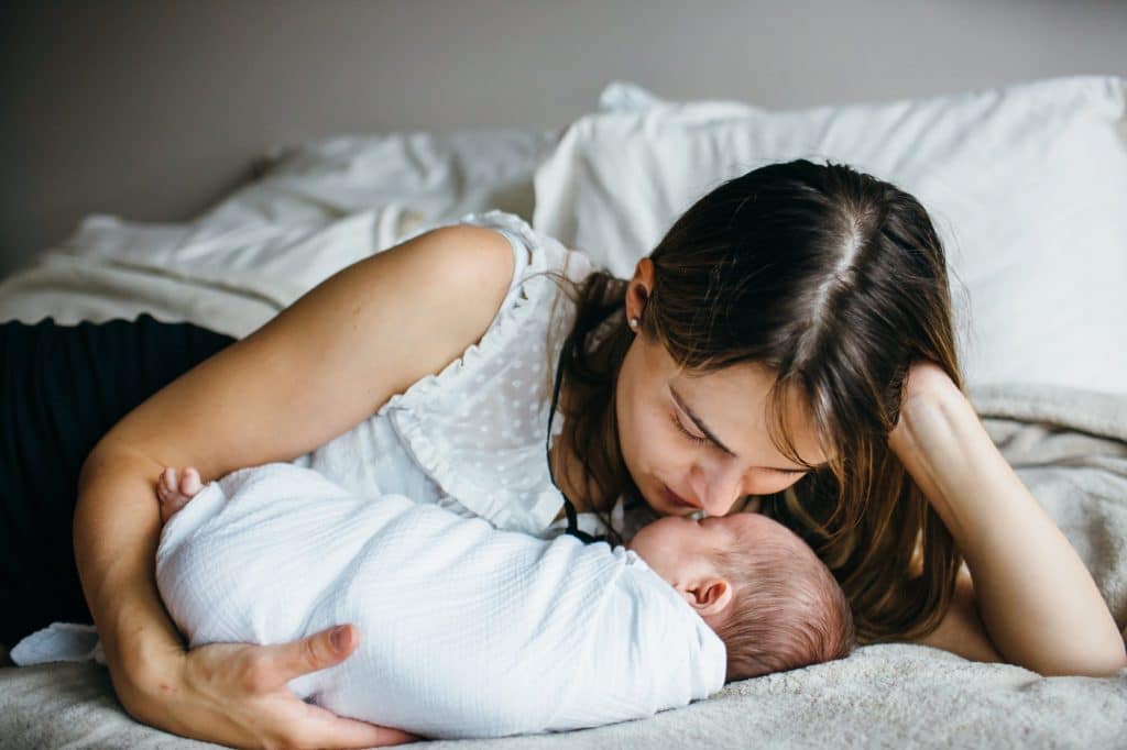 mom and baby snuggling chelmsford newborn photographer 